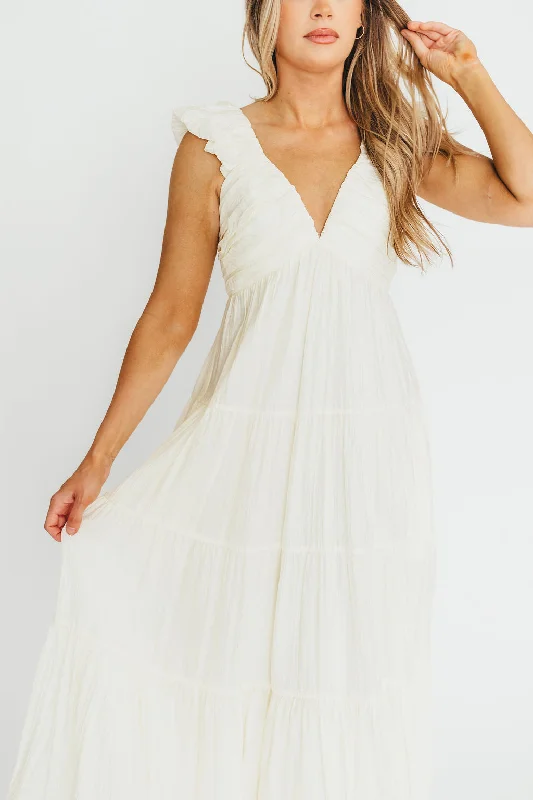 Midi dresses with ruffled sleeves for a more feminine and voluminous look Katy Pleated Bodice Midi Dress in Cream  - Bump Friendly